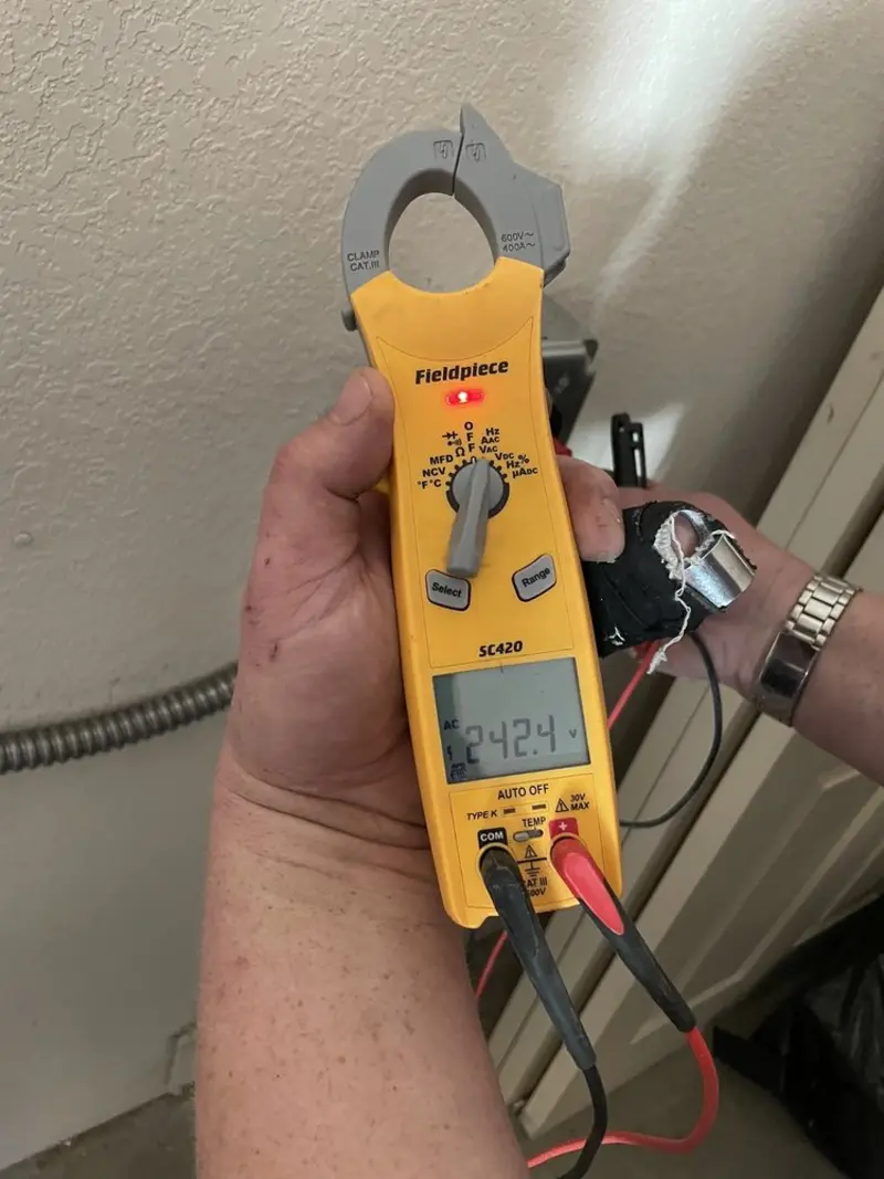 Voltage testing with clamp meter during Hot Tub / Pool Electrical Wiring in Kayenta